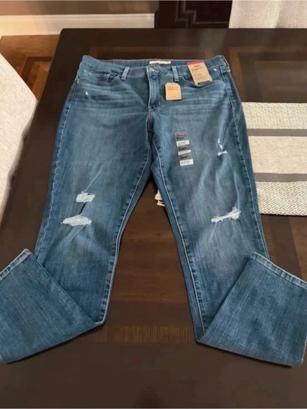 Levi's 311 Women's Skinny Jeans in Medium Blue with Distressed Details